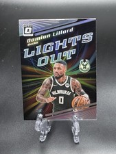 2023-24 DONRUSS OPTIC DAMIAN LILLARD LIGHTS OUT HOLO PRIZM BUCKS BLAZERS