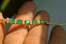 6 Ct Oval Cut Simulated Emerald Women Tennis Bracelet 14k Yellow Gold Plated