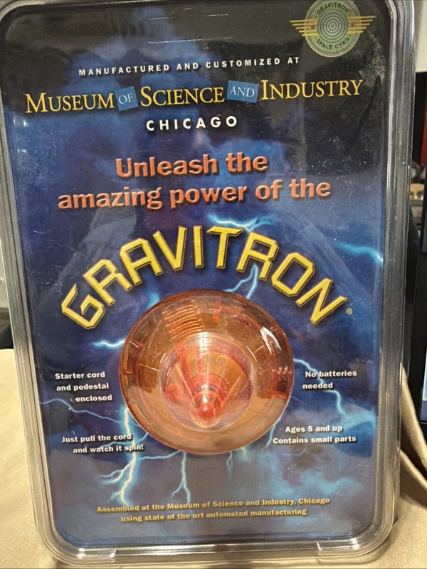 GRAVITON Museum of Science and Industry Chicago Toy Gyro Sppinng Top Orange NIB