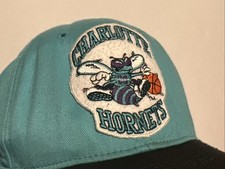 VINTAGE 90's CHARLOTTE HORNETS NBA UNIVERSAL MADE IN USA SNAPBACK CAP HAT WEAR