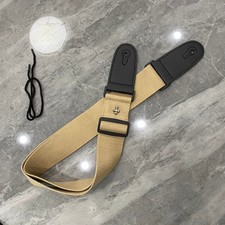 Khaki guitar strap, highly functional, currently on sale. Fast shipping.