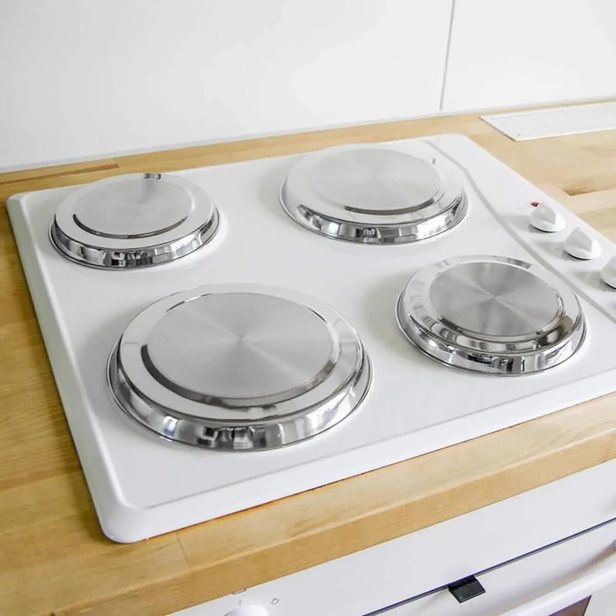 Cache-plaques en inox lot de 4 pour masquer les brûleurs sales et protéger la cuisinière