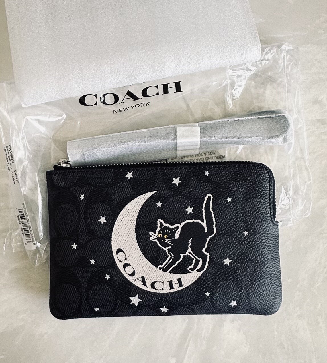 NWT COACH BLACK/MULTI HALLOWEEN SIGNATURE CORNER ZIP WRISTLET CW869