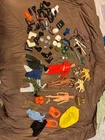 Lot of 1964-1975 G.I. Joe 4 dolls, shoes, guns