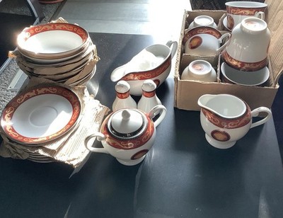 60-Piece T. Limoges Porcelain Dinnerware Set .Medusa Style   Red/Gold