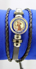St Christopher PU leather bracelet and glass cabochon.