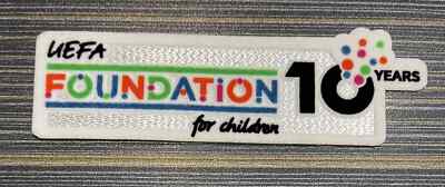 2025-2026 UEFA FOUNDATION 10 Jahre Player Sleeve Patch Bügelbild LIMITED EDITION