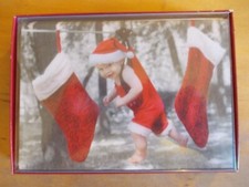 Pack of 10 Leanin' Tree Christmas cards with designed envelopes.