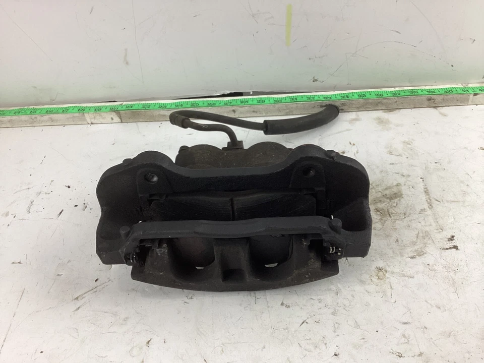 Pinza de freno delantera izquierda del lado del conductor Dodge Grand Caravan 2013-2018 OEM Foto 2 de 4