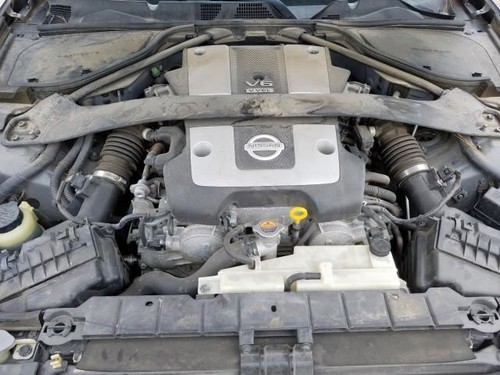 Nissan 370Z Roadster 2009-2012 bisel de cambio automático con botón de peligro - Imagen 11 de 12