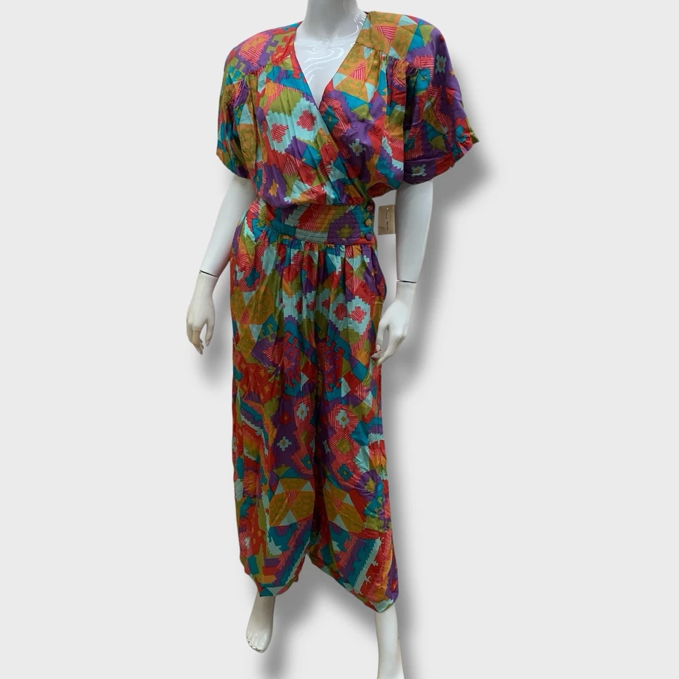 Mono deportivo vintage Stewart envolvente de seda talla M rosa púrpura geométrico cuello en V LEER Foto 3 de 4