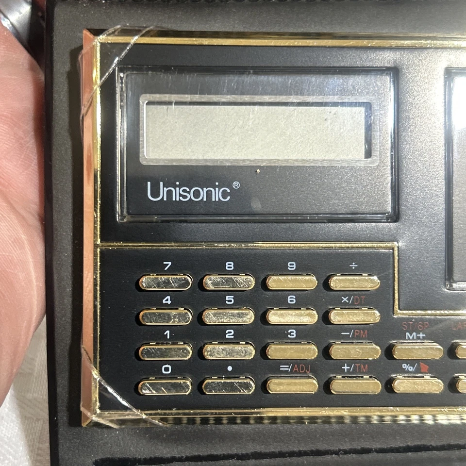 Computadora de viaje portátil Unisonic International vintage NUEVA RARA - Modelo 9595 Foto 2 de 4