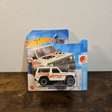 HOT WHEELS NISSAN PATROL COSTOM 2021 MATTEL " DAMAGE CARD" 1.64  