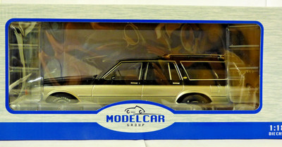 MCG Model Car Group Maßstab 1:18 1985 Chevrolet Caprice Station Wagon silber/schwarz