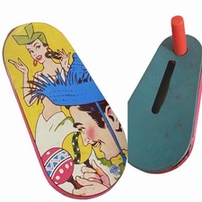 Vtg noisemaker Dancing Couple Tin New Years Eve US Metal Toys