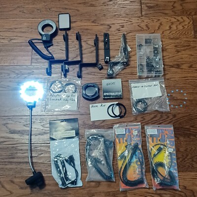 Lot of Camera Photography Equipment Lens and flash accessories, grips, cords.