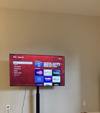 TCL Roku TV 58 in LED Roku Smart TV 1080p FHD Flat Screen Black and tv stand