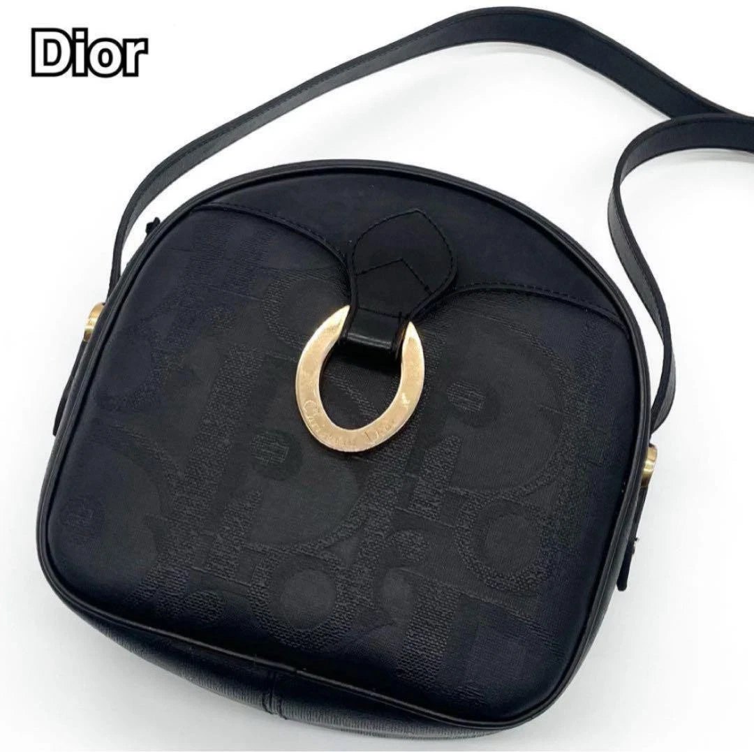 Beau sac à bandoulière Dior ovale trotteur motif total cuir marine