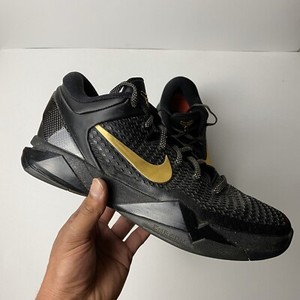 kobe bryant shoes black and gold