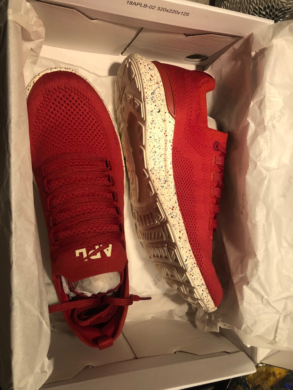 red apl sneakers