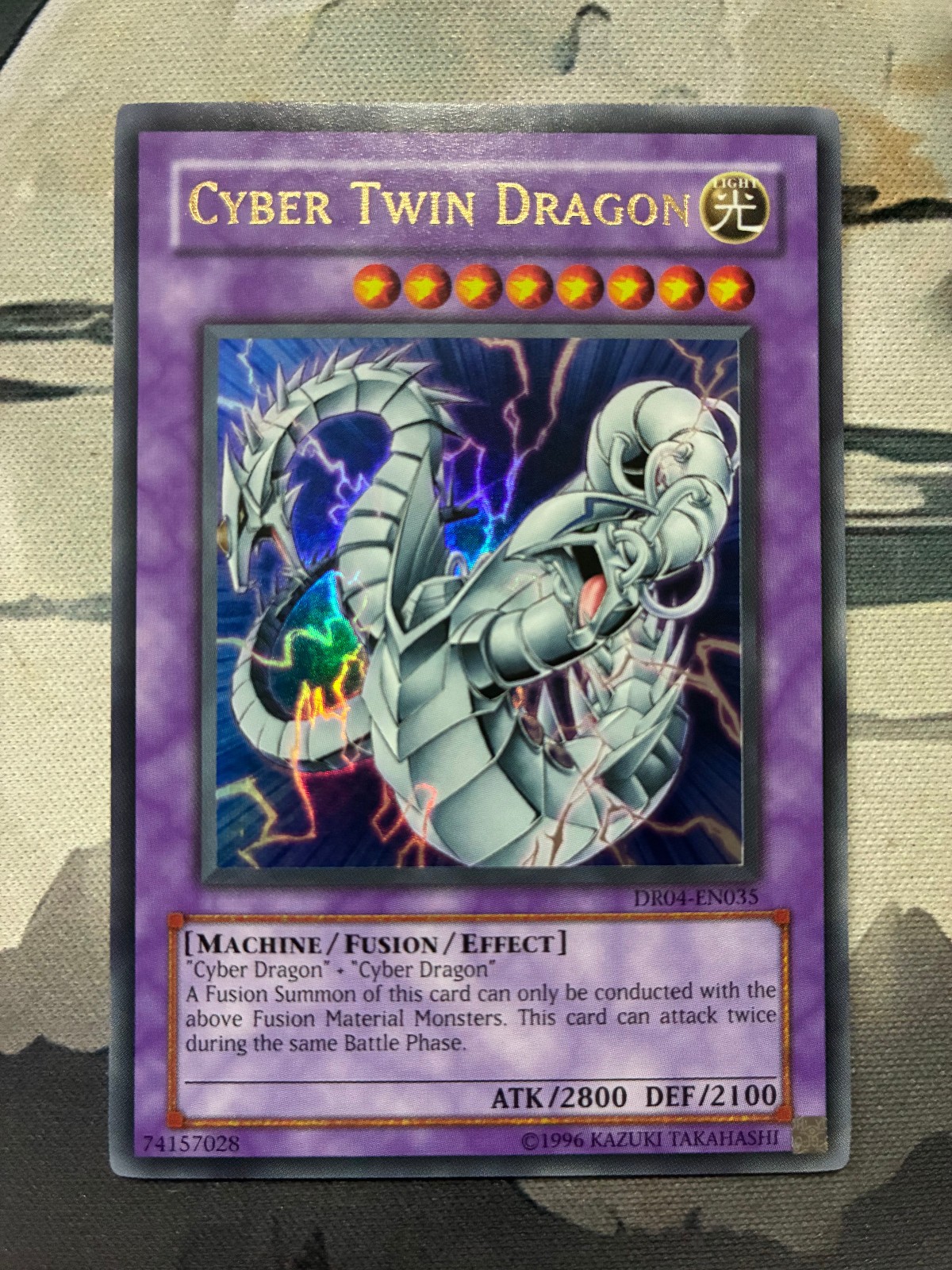 Cyber Twin Dragon DR04-EN035 (YuGiOh Dark Revelation Volume 4) — is it worth grading?
