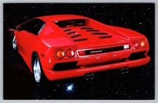 Evanston Illinois Chrysler Lamborghini Diablo Floating Outer Space postcard D7