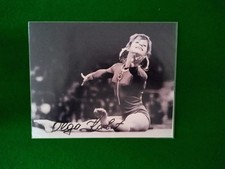 LARGE SIGNED PHOTO OF OLGA KORBUT, RUSSIAN GYMNAST & OLYMPIC GOLD MEDALLIST