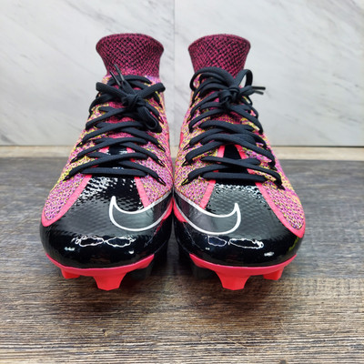 black and pink football cleats