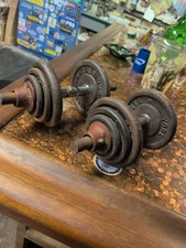 Vintage 1" York Barbell adjustable dumbbell pair with handles and York collars
