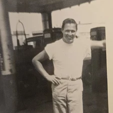 Vintage B&W Photo Snapshot of Handsome Man Standing at Old Gas Station