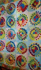 Multicolored Wheels Art Quilt