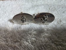 pair of sterling silver fleur-de-lis cufflinks