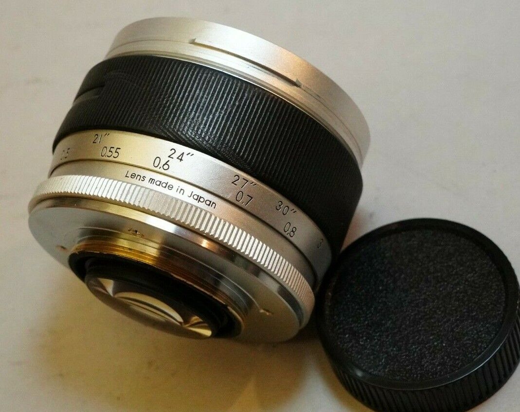 Original Tokyo Kogaku RE Auto Topcor 58mm f/1.4 Lens Silver Original Tokyo Kogaku RE Auto Topcor 58mm f/1.4 Lens Silver
