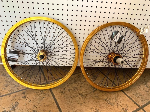black bike gold wheels