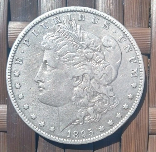 1895-O Morgan Silver Dollar XF  There is no best offer.  Ebay puts this on here.