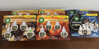 2 SETS OF 3 OR 4 PACK AIRWICK PLUG IN REFILLS, NEW, BROWN SUGAR, PUMPKIN, BEACH