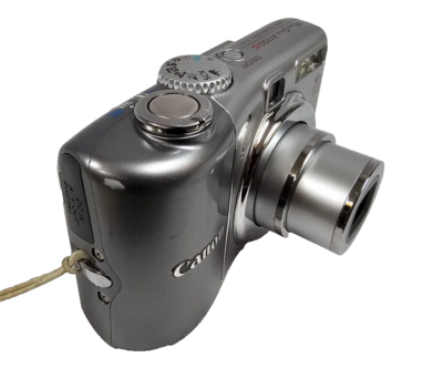 Working Canon PowerShot A1100 IS 12.1MP Silver Digital Camera 4x