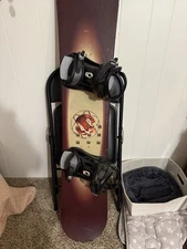 Burton Arrow Model. The Bindings Are Burton Brand. The Length Is 147 CM