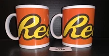 2 Reese's Peanut Butter Cup Ceramic Orange Galerie Coffee Mugs Cups
