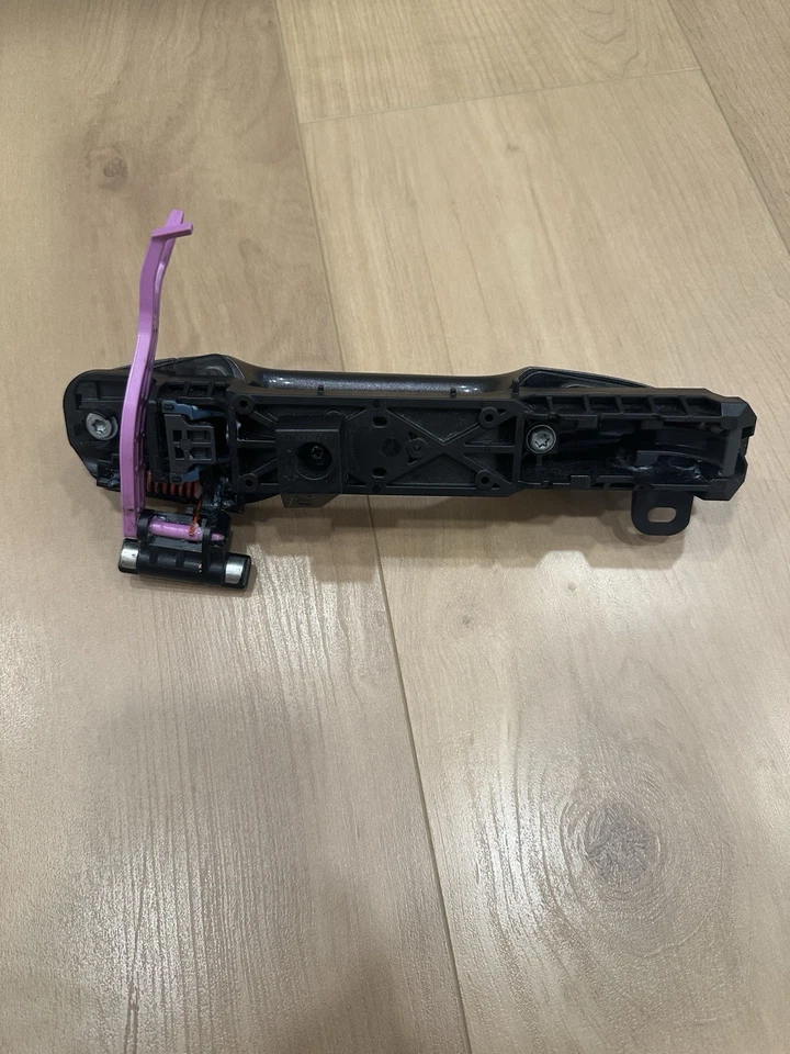 Manija de puerta derecha exterior + marco OEM genuino Toyota Rav4 [69211-0R020] (2013-2016) Foto 3 de 4