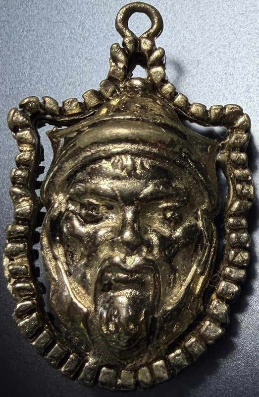 Pendant/Fob: Silver-color, male face with goatee and narrow eyes (Lot#19)