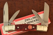JA HENCKELS  SOLINGEN GERMANY RED BONE PREMIUM CONGRESS KNIFE NICE (27819)