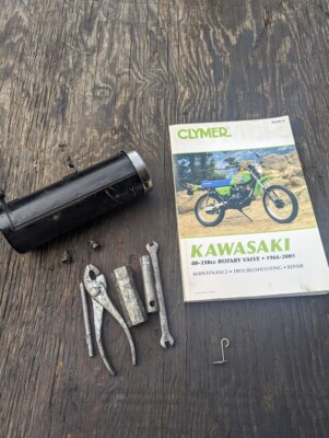 1971 KAWASAKI F8 BISON 250 TOOL BOX HOLDER KIT AND CLYMER SERVICE MANUAL