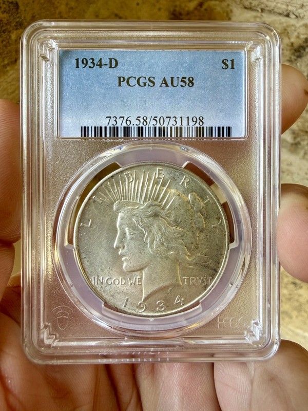 1934-D PEACE DOLLAR - PCGS AU-58. Semi-Key Date