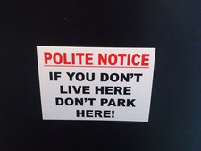 POLITE NOTICE - IF YOU DON'T LIVE HERE DON'T PARK HERE - RESIDENTS PARKING SIGN