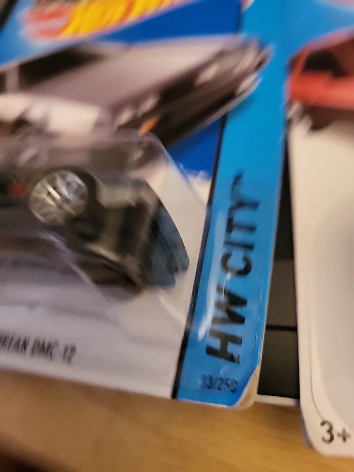 2014  HOT WHEELS - HW CITY 81' Delorean DMC-12 - red and dark grey variants  - Image 3 of 4