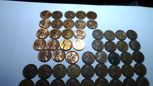 Nice lot of 61 Wheat Pennies +10 Uncirculated 1959 & Early 1960's
