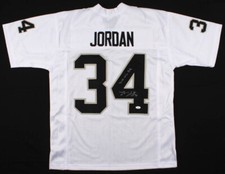 Camiseta firmada por LaMont Jordan de los Oakland Raiders con la inscripción "Just Win Baby" (certificado de autenticidad JSA)