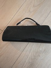 Vintage black patent leather clutch handbag.