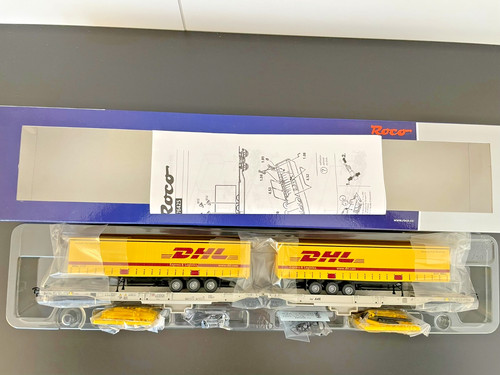 Roco H0 76425 Doppeltaschen-Gelenkwagen T2000 "DHL" der AAE Epoche VI neu! | Condition: Neu